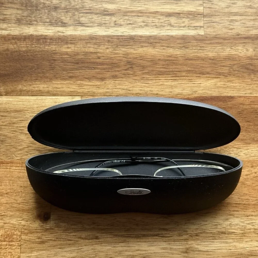 Silhouette Eyeglasses Mod 7395 Frameless Preowned AUTHENTIC TITAN Austria